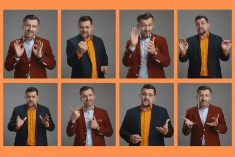 Mężczyzna w garniturze wygłasza krótkie przemówienie z okazji urodzin, gestykulując i wyrażając emocje.